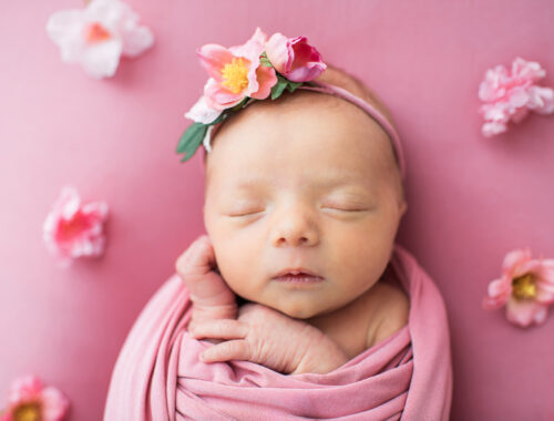 Newborn baby girl on pink floral backdrop, Knoxville TN newborn photography studio