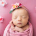 Newborn baby girl on pink floral backdrop, Knoxville TN newborn photography studio
