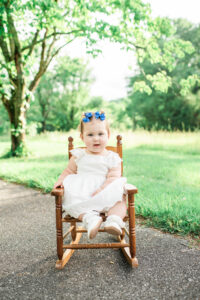 One-year-old Juliana sitting in rocking chair, Harriman first birthday photography