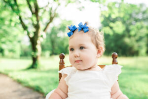 Close-up of one-year-old Juliana in rocking chair, Harriman first birthday session
