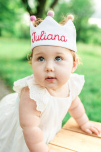 Close-up of one-year-old Juliana wearing birthday crown, Harriman first birthday photography