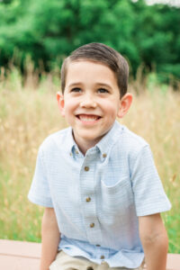Close-up portrait of six-year-old boy Beckett outdoors, Knoxville family photography