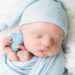 Close up newborn baby with blue heart prop, Knoxville newborn photography studio