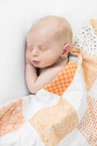 Newborn baby boy making a pout face, Knoxville newborn photography studio